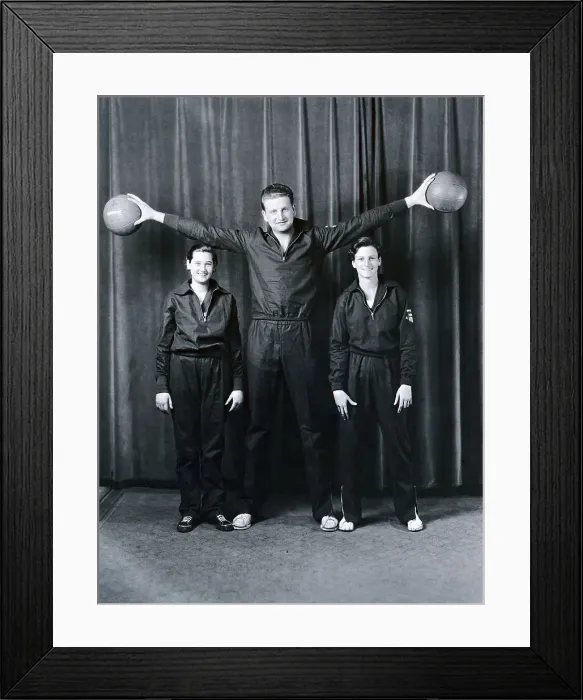 Framed Print : Basketball Player Towers over Babe Didrikson Framed Print : Basketball Player Towers over Babe Didrikson