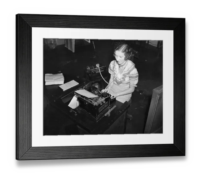 Framed Print : Woman Transcribing From a Dictaphone Framed Print : Woman Transcribing From a Dictaphone