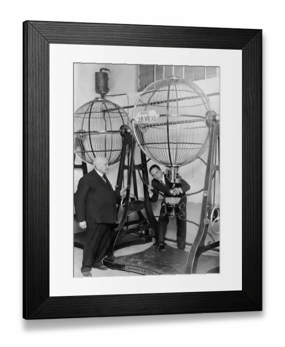 Framed Print : Man Demonstrates Speres Used for Lottery Framed Print : Man Demonstrates Speres Used for Lottery