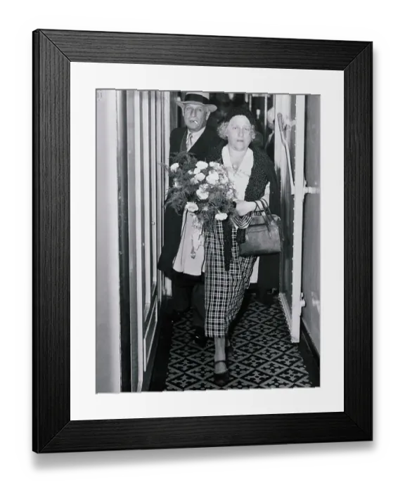 Framed Print : Mrs. Albert Einstein Walking with Bouquet of Flowers Framed Print : Mrs. Albert Einstein Walking with Bouquet of Flowers