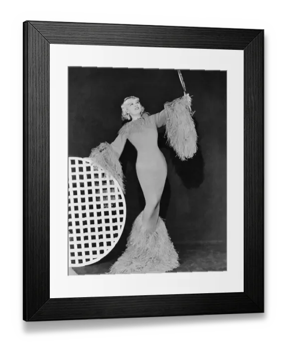 Framed Print : Mae West Posing in Feathered Gown Framed Print : Mae West Posing in Feathered Gown