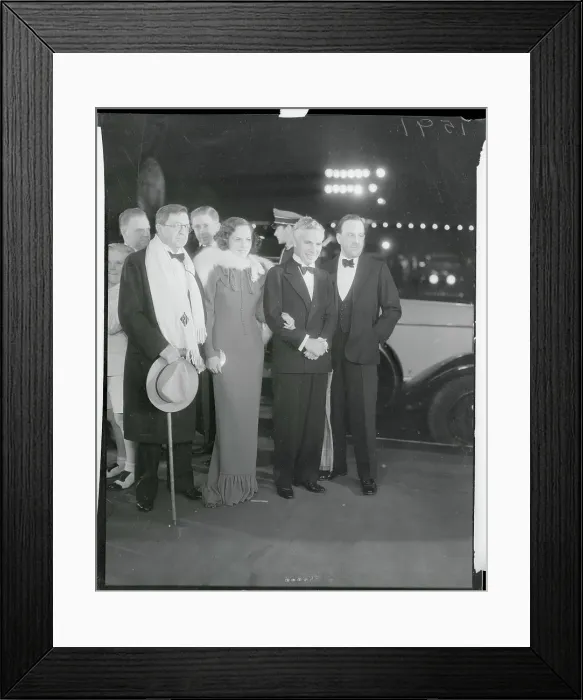 Framed Print : Charlie Chaplin Posing with Colleagues Framed Print : Charlie Chaplin Posing with Colleagues