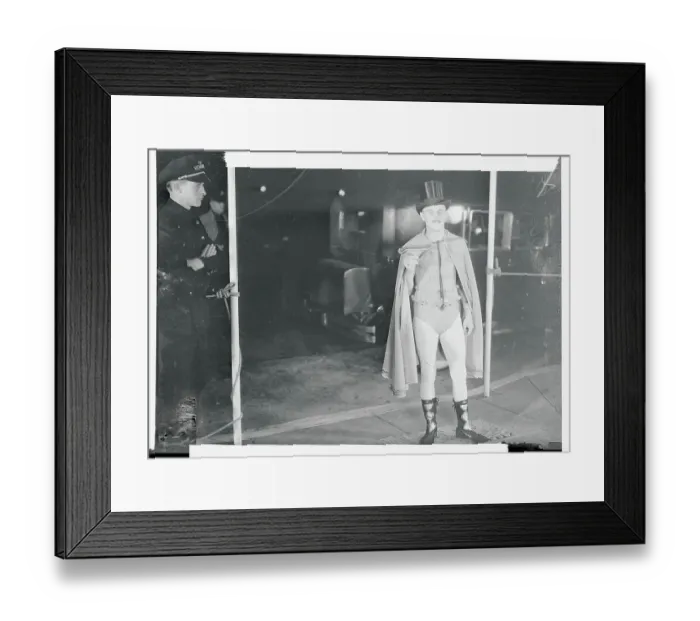 Framed Print : Daryl Zanuck Wearing Caped Outfit near Doorman Framed Print : Daryl Zanuck Wearing Caped Outfit near Doorman