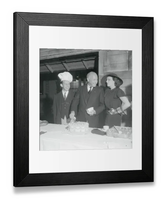 Framed Print : Cecil B. Demille Cutting Cake Framed Print : Cecil B. Demille Cutting Cake