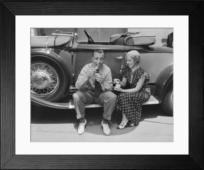 Framed Print : Actors Bing Crosby and Mary Pickford Sharing Snack on Automobile Framed Print : Actors Bing Crosby and Mary Pickford Sharing Snack on Automobile