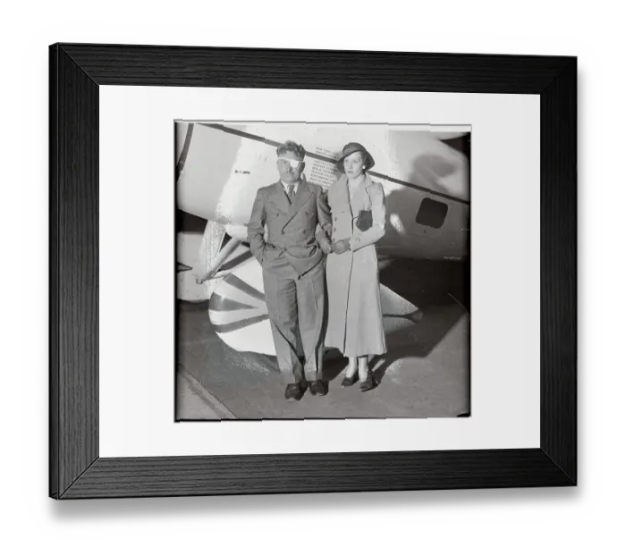 Framed Print : Wiley Post Posing with Wife and Airplane