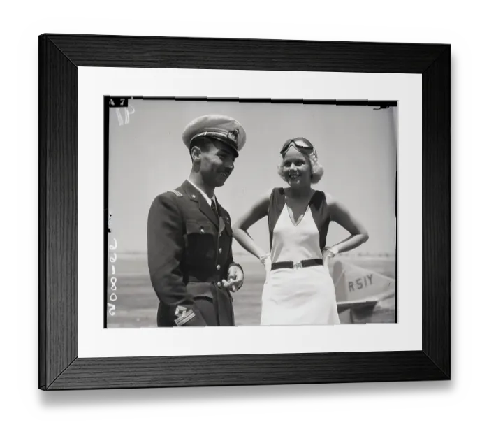 Framed Print : Jean Harlow With Italian Air Man Framed Print : Jean Harlow With Italian Air Man