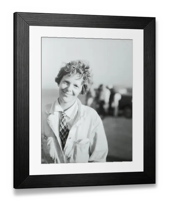 Framed Print : Aviatrix Amelia Earhart Smiling at Airfield