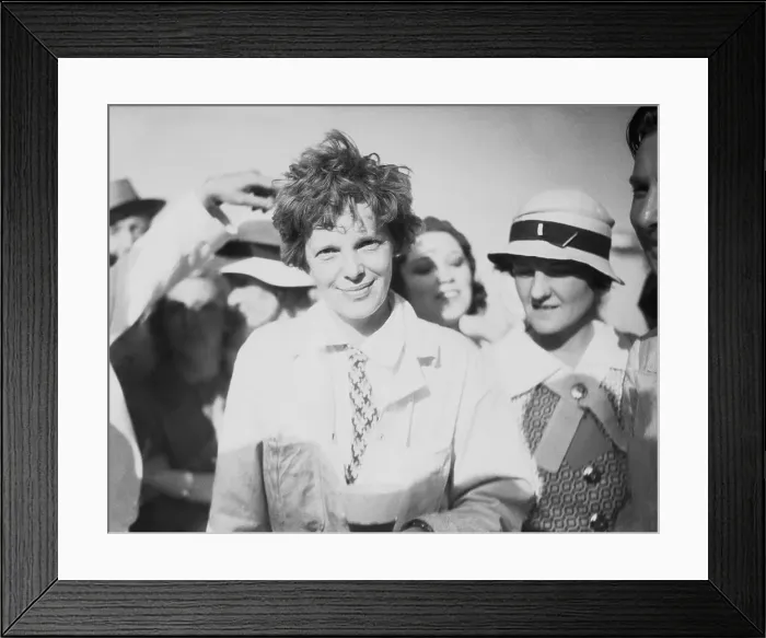 Framed Print : Aviatrix Amelia Earhart Smiling at Airfield