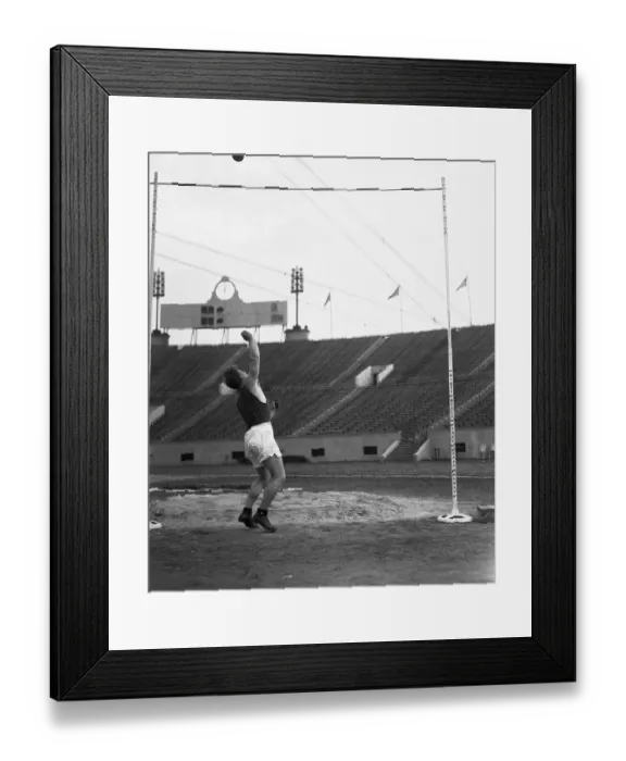 Framed Print : Athlete Tossing Weight Framed Print : Athlete Tossing Weight