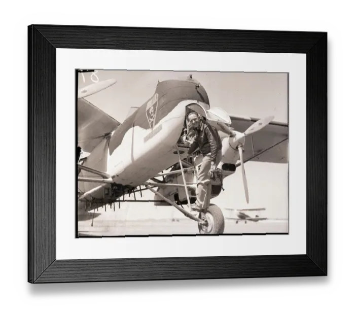 Framed Print : Pilot Enters Douglas Bomber Through Nose Framed Print : Pilot Enters Douglas Bomber Through Nose