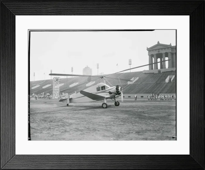 Framed Print : Don Juan De La Cierva Landing Airplane on Stadium Grounds Framed Print : Don Juan De La Cierva Landing Airplane on Stadium Grounds