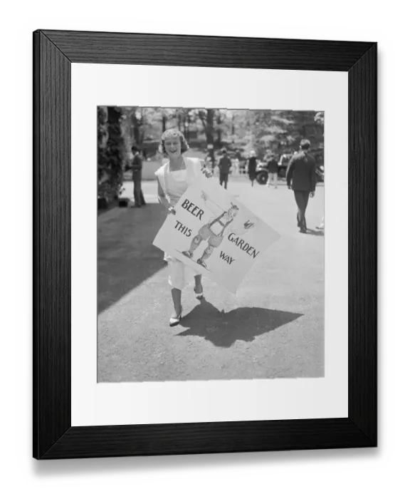 Framed Print : Girl Holding Beer Garden Sign Framed Print : Girl Holding Beer Garden Sign
