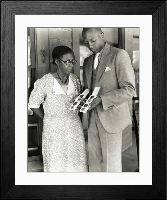 Framed Print : Jesse Owens Showing Mother Medals Framed Print : Jesse Owens Showing Mother Medals