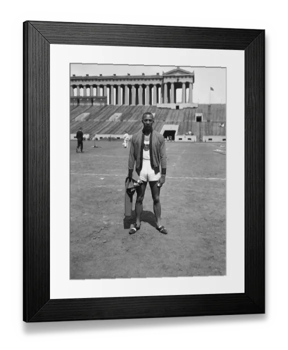 Framed Print : Jesse Owens Posing Beside Track Framed Print : Jesse Owens Posing Beside Track