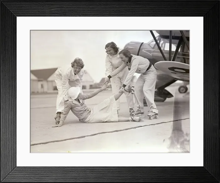 Framed Print : Amelia Earhart and Aviatrices Aid Fallen Skater Framed Print : Amelia Earhart and Aviatrices Aid Fallen Skater