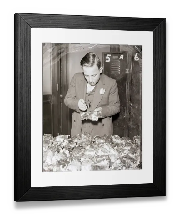 Framed Print : Customs Inspector Examines Opium Package