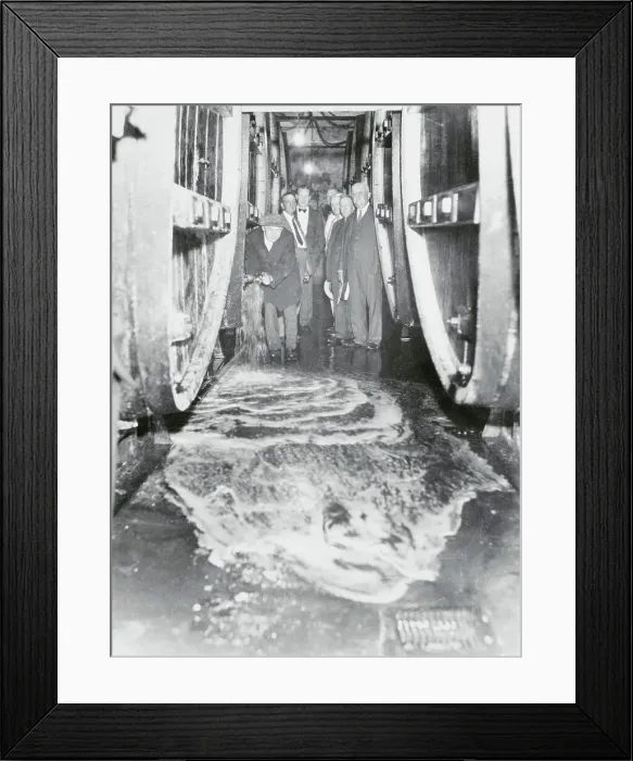 Framed Print : Man Pouring Wine into Sewer Framed Print : Man Pouring Wine into Sewer
