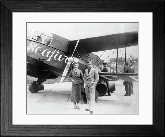 Framed Print : Amy and James Mollison Posing by Airplane Framed Print : Amy and James Mollison Posing by Airplane