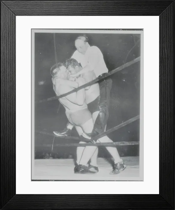 Framed Print : Referee Breaking Up Wrestlers Framed Print : Referee Breaking Up Wrestlers