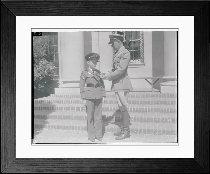 Framed Print : Earl Foxe Observing Medal on Young Cadet Framed Print : Earl Foxe Observing Medal on Young Cadet