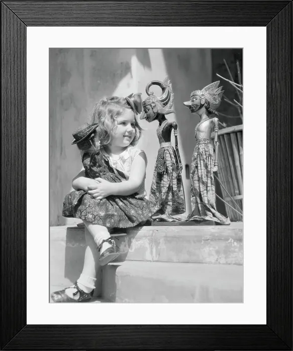 Framed Print : Girl Posing with Dolls Framed Print : Girl Posing with Dolls
