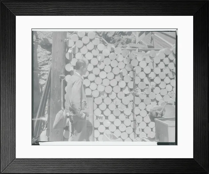 Framed Print : Government Worker Examining Cement Collection