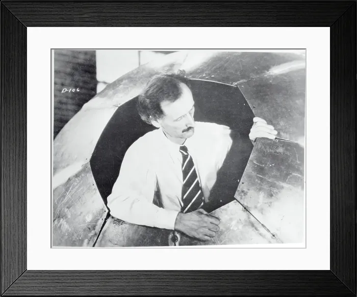 Framed Print : Man Inside Metal Ball Framed Print : Man Inside Metal Ball