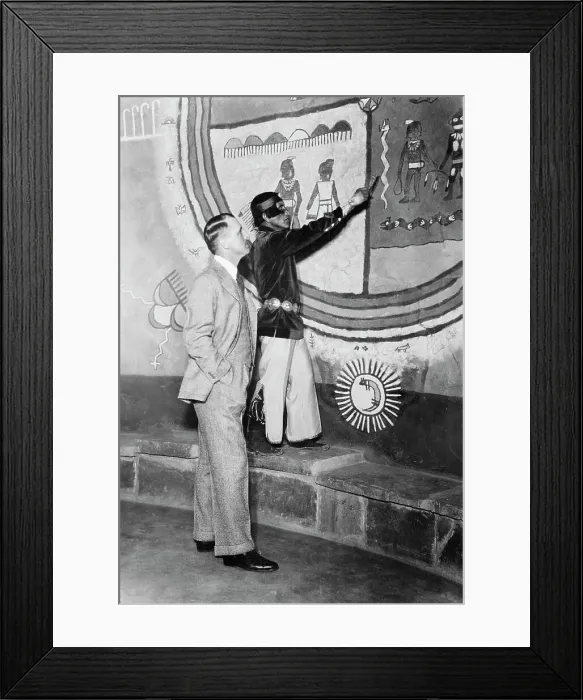 Framed Print : Artist Explaining Symbolism to Visitor