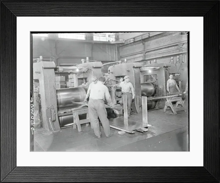 Framed Print : Men Working with Automobile Sheets
