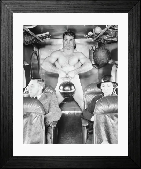 Framed Print : Man Working Out in a Plane