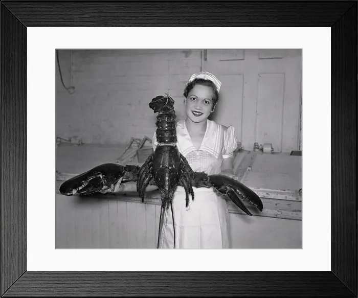 Framed Print : Woman Holding Large Lobster Framed Print : Woman Holding Large Lobster