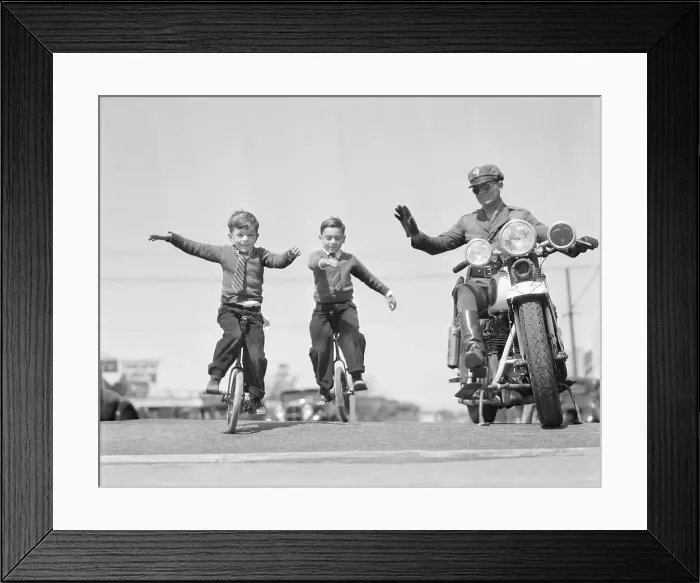 Framed Print : Brothers Riding Unicycle Framed Print : Brothers Riding Unicycle