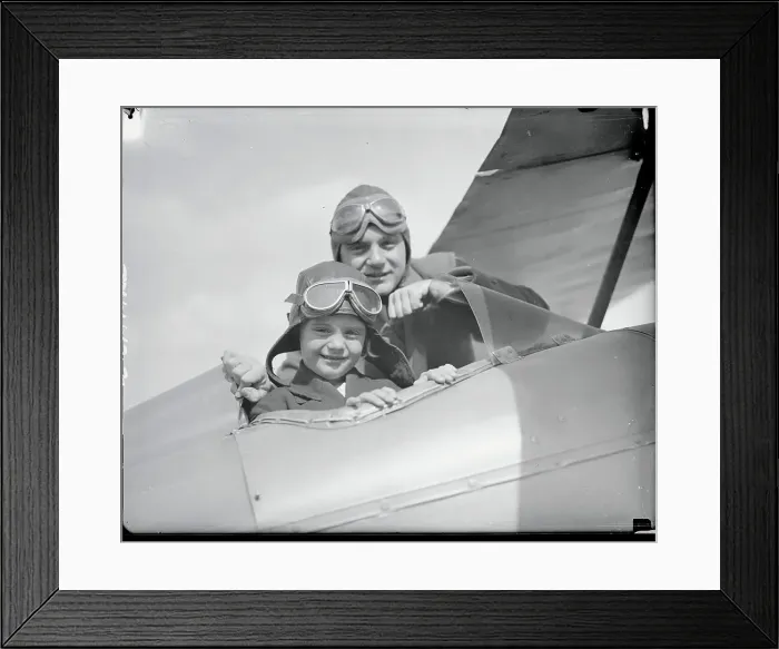 Framed Print : Jack Kirkland in Airplane with Daughter Framed Print : Jack Kirkland in Airplane with Daughter