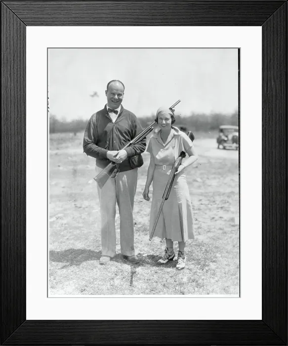 Framed Print : Husband and Wife Holding Rifles Framed Print : Husband and Wife Holding Rifles