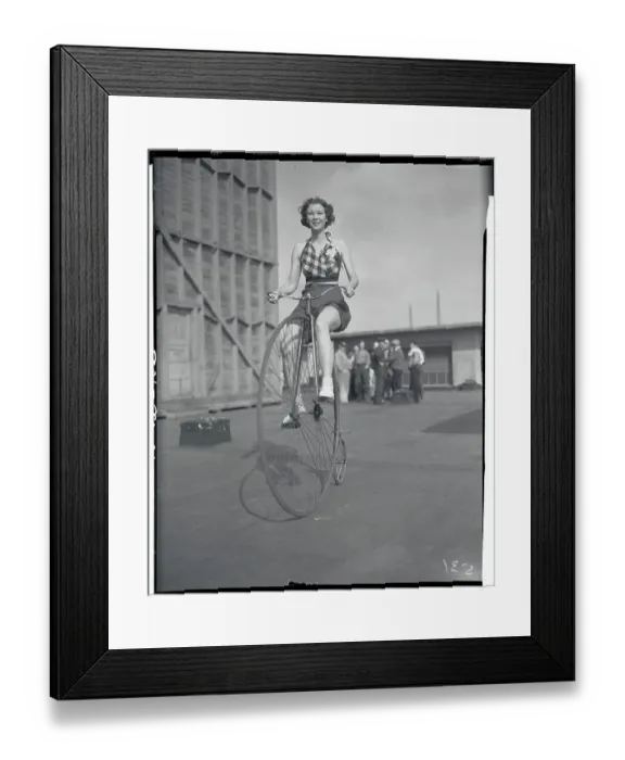 Framed Print : Lucille House Riding Highbike Framed Print : Lucille House Riding Highbike