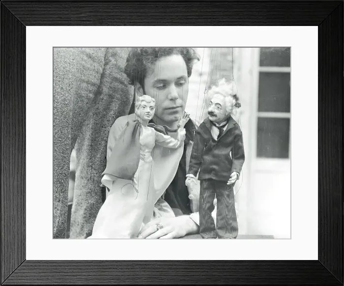 Framed Print : Man with Famous Personality Hand Puppets Framed Print : Man with Famous Personality Hand Puppets