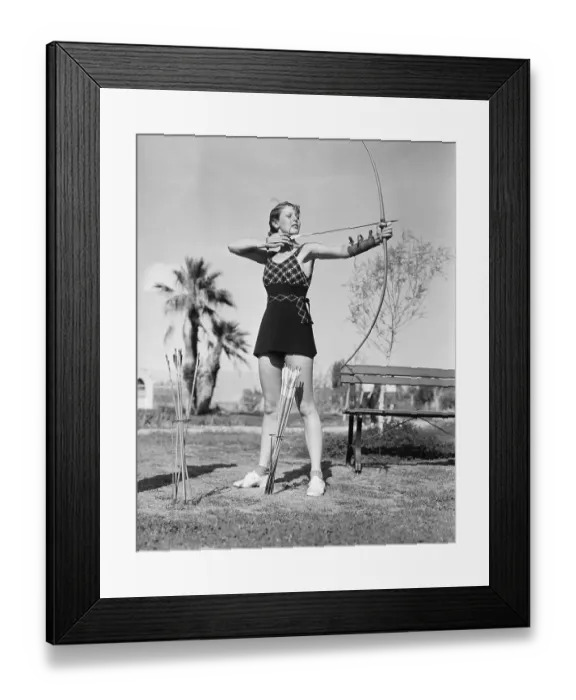 Framed Print : Actress Loretta Young Aiming Bow and Arrow Framed Print : Actress Loretta Young Aiming Bow and Arrow