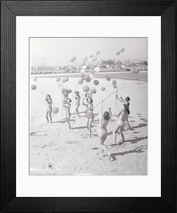 Framed Print : Female Archers Targeting Balloons