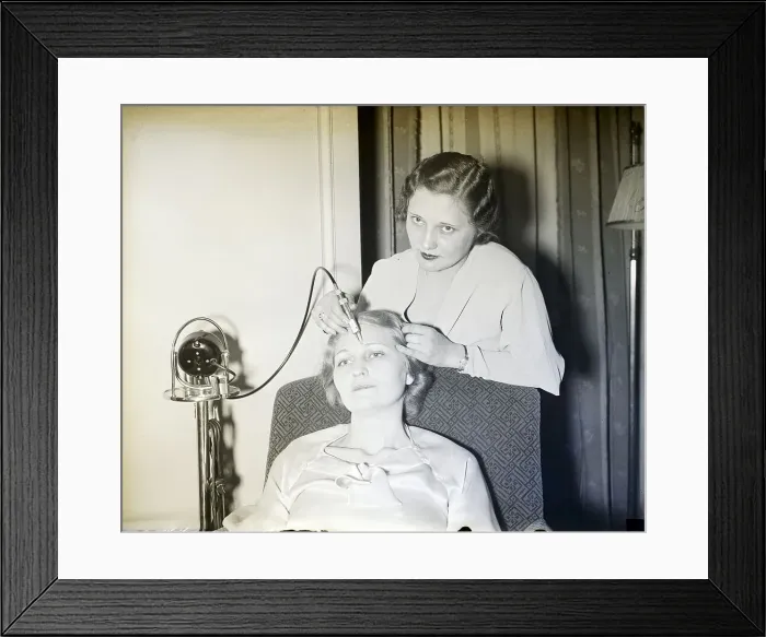 Framed Print : Woman Plucking Model's Eyebrows Framed Print : Woman Plucking Model's Eyebrows
