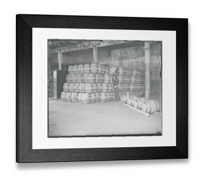 Framed Print : Worker Lifting Beer Barrel Framed Print : Worker Lifting Beer Barrel