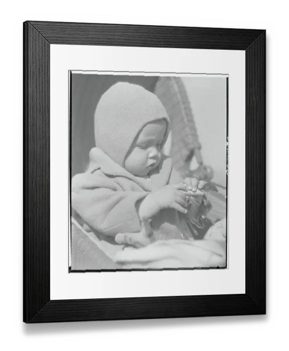 Framed Print : Baby Concentrating on His Toy Framed Print : Baby Concentrating on His Toy