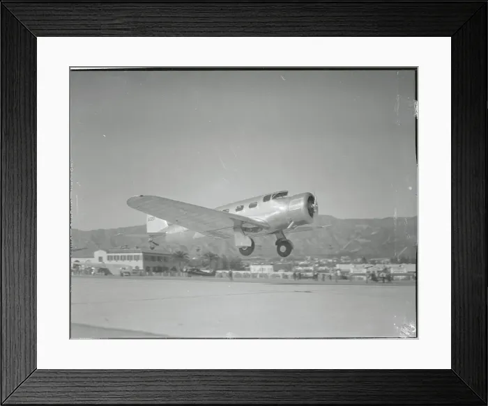 Framed Print : Newly Designed Airplane Landing on Runway Framed Print : Newly Designed Airplane Landing on Runway