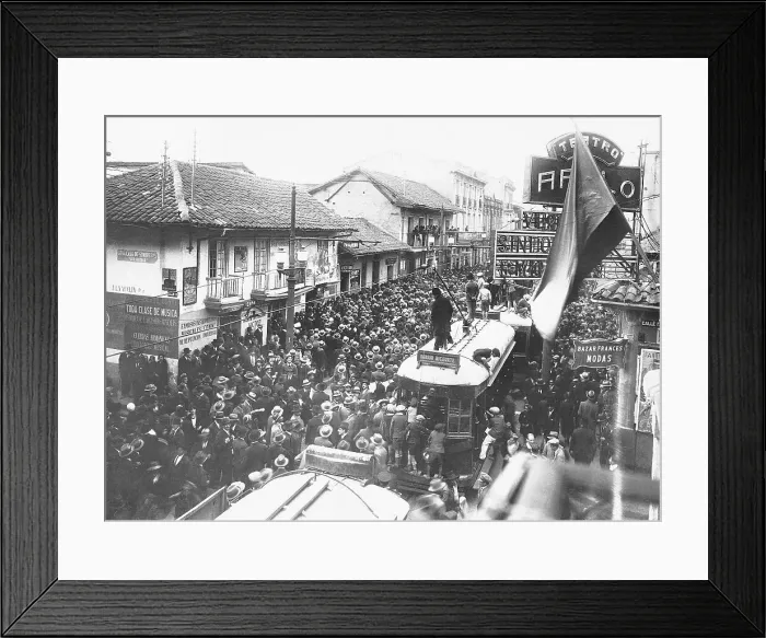 Framed Print : Crowds Cheer Victory in Street
