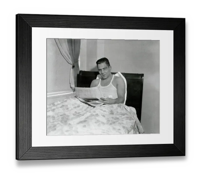 Framed Print : Jim Browning Reading About Victory