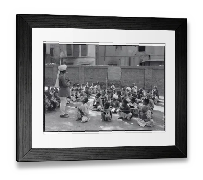 Framed Print : Teacher Instructing Class Outdoors Framed Print : Teacher Instructing Class Outdoors