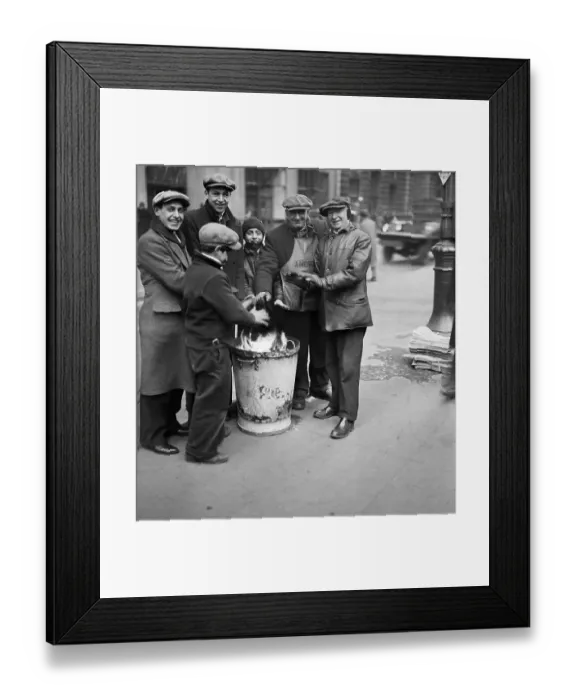 Framed Print : Group Huddled Around a Fire