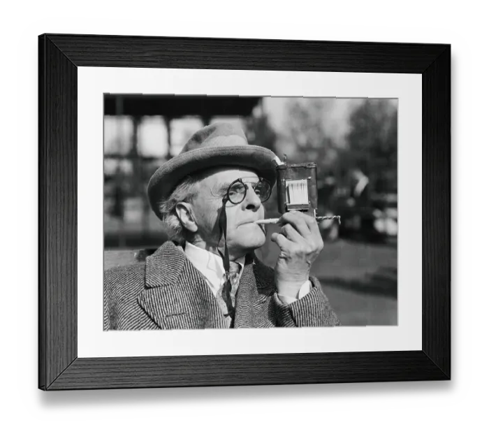 Framed Print : Inventor Demonstrating His Cigarette Roller Framed Print : Inventor Demonstrating His Cigarette Roller