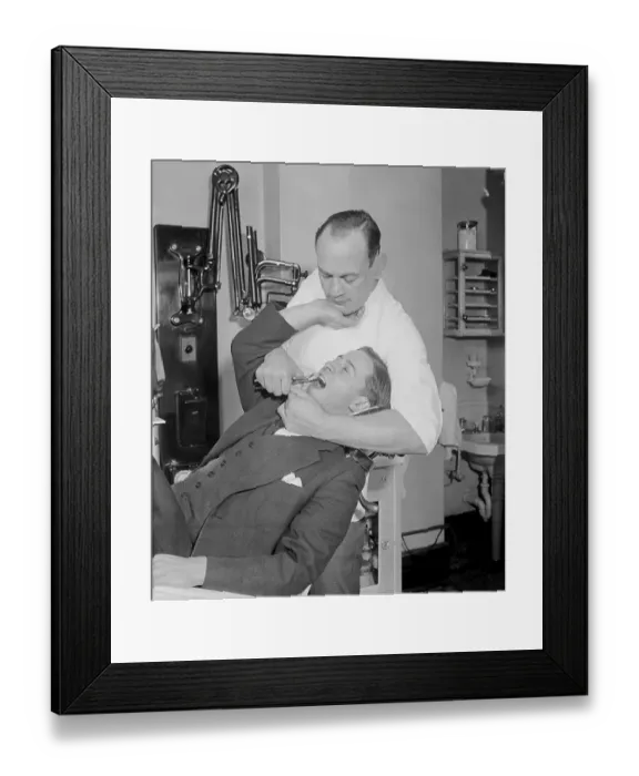 Framed Print : Dentist Extracting Molars Framed Print : Dentist Extracting Molars