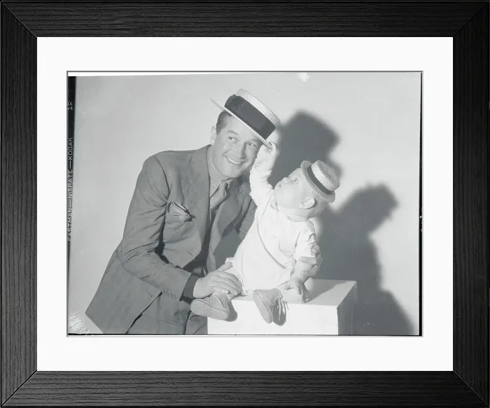 Framed Print : Maurice Chevalier and Baby Framed Print : Maurice Chevalier and Baby